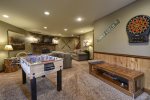 Family Room with foosball, darts, fireplace